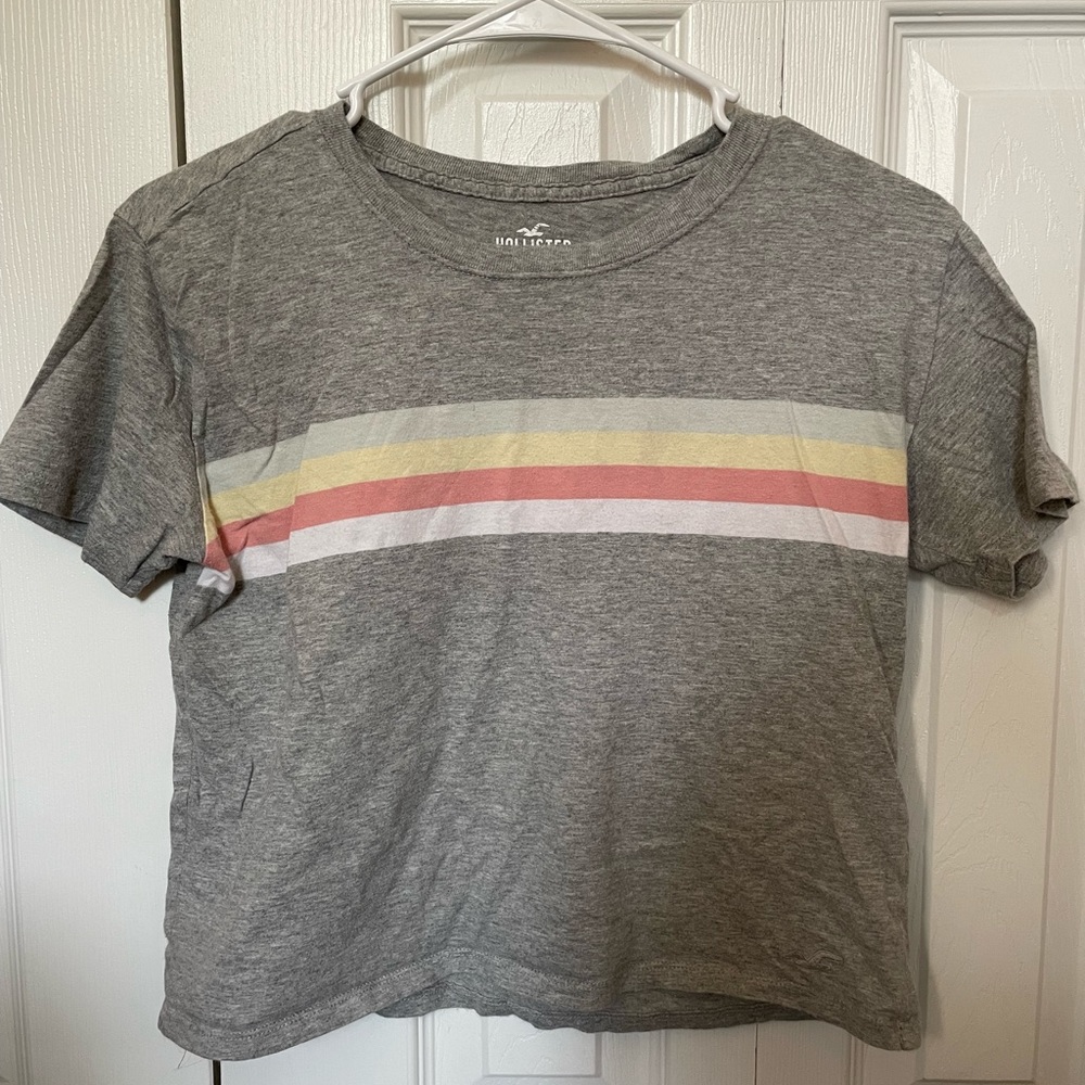 Hollister crop top. Grey with blue, yellow, red, and a white stripe. - Picture 1 of 3